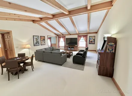 a bedroom with double bed and a window