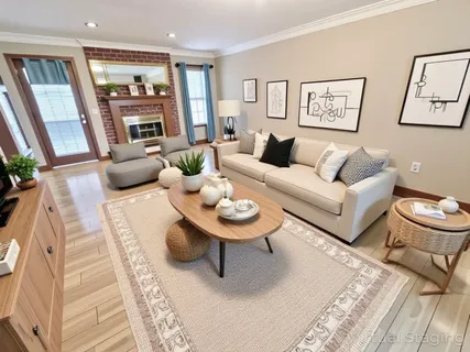 a kitchen with granite countertop kitchen island stainless steel appliances a stove refrigerator sink and cabinets