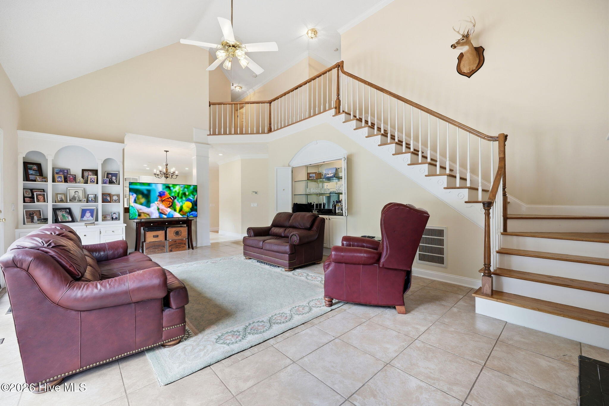 4076 Mobleys Bridge Road Grimesland, NC 27837 - Photo 18 of 66 the back living overlooks the pool and steps off to a raised patio