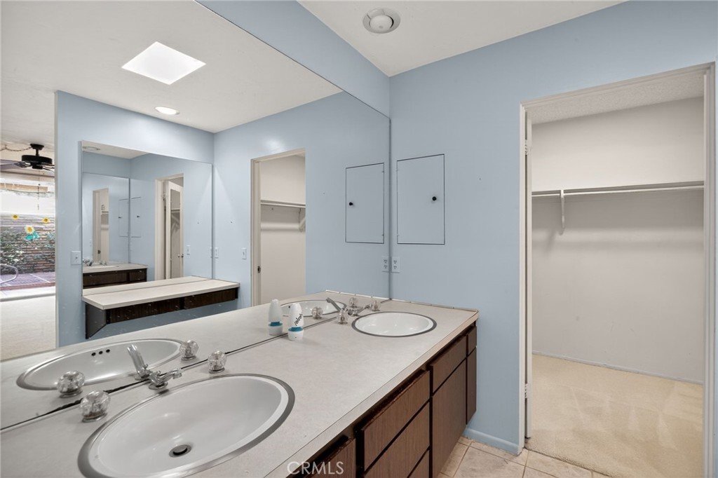 76695 Roadrunner Drive Indian Wells, CA 92210 - Photo 21 of 29 a bathroom with a sink and a mirror