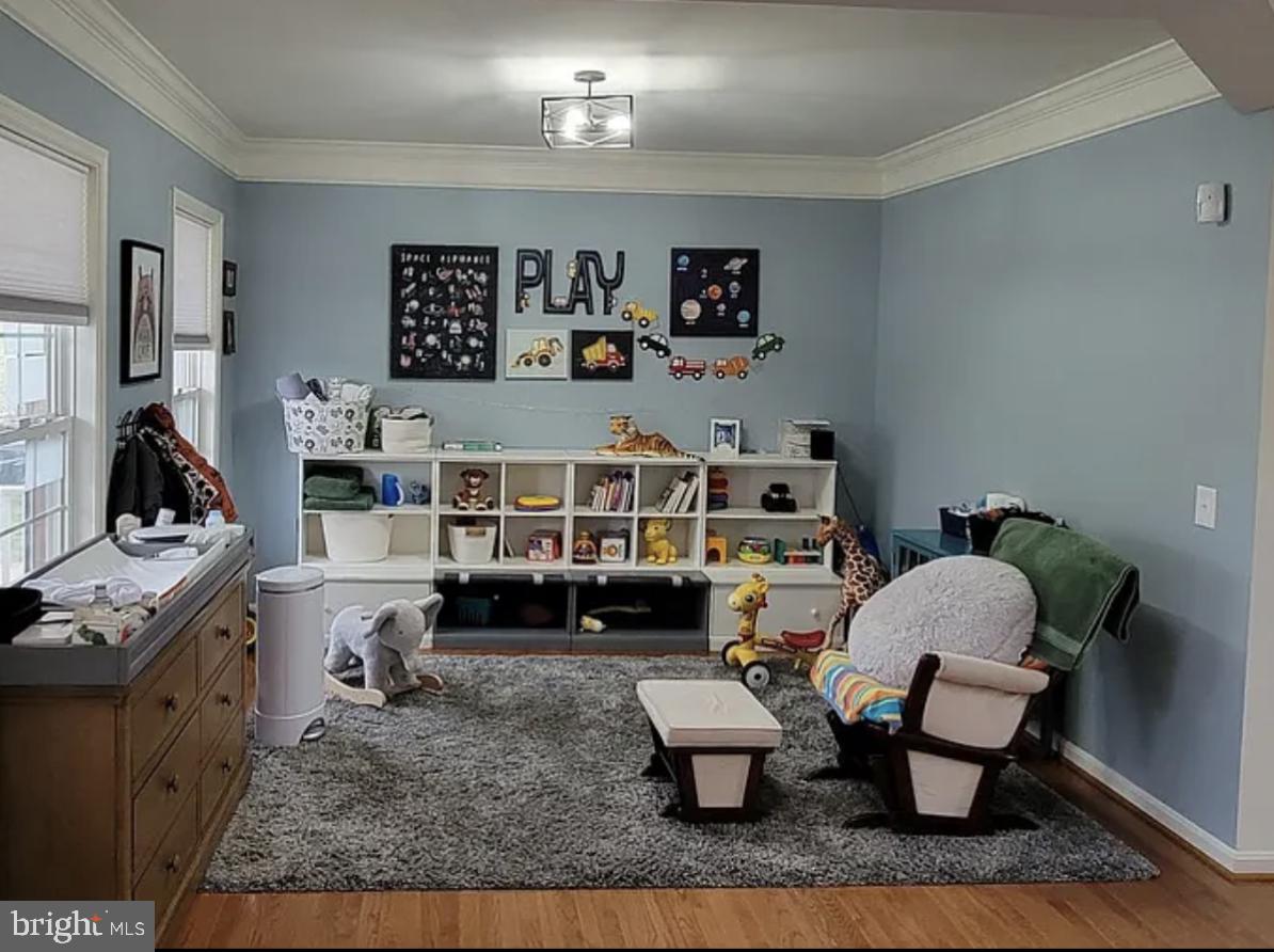 842 Kingsbrook Road Culpeper, VA 22701 - Photo 13 of 24 a living room with furniture and a wooden floor