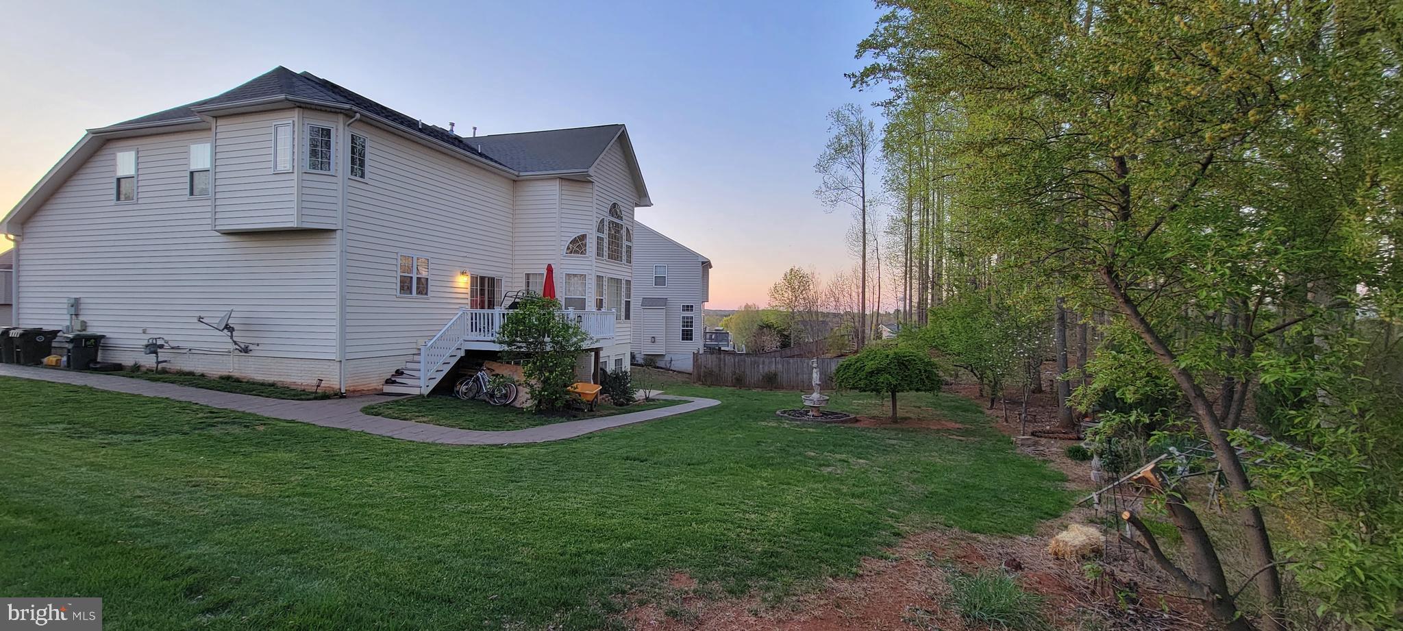 842 Kingsbrook Road Culpeper, VA 22701 - Photo 3 of 24 a front view of a house with a yard