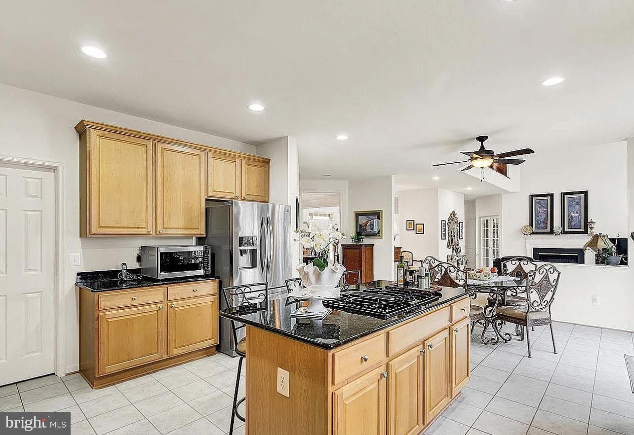 842 Kingsbrook Road Culpeper, VA 22701 - Photo 8 of 24 a kitchen with granite countertop a sink appliances cabinets and counter space