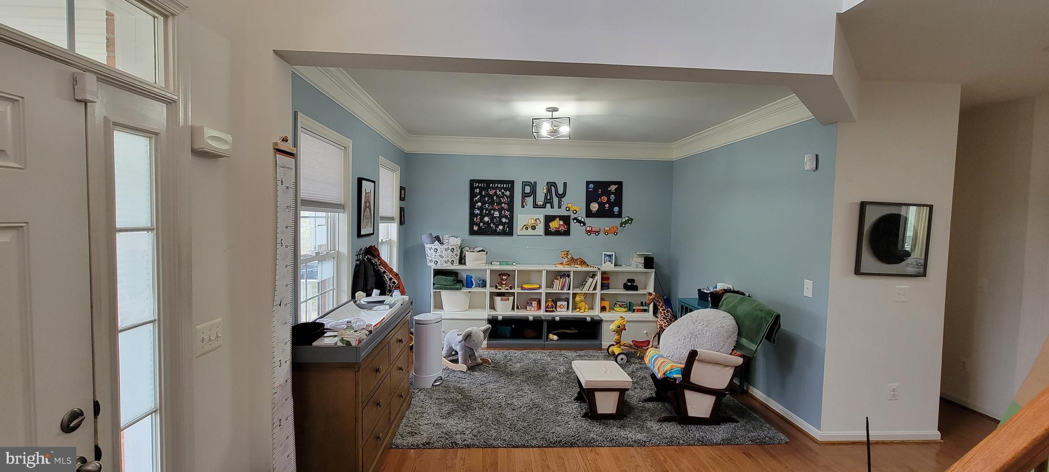 842 Kingsbrook Road Culpeper, VA 22701 - Photo 10 of 24 a view of a workspace with furniture and a livingroom