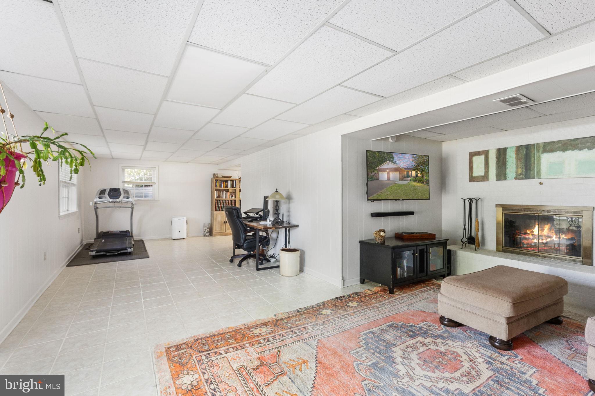 6028 St Pauls Road King George, VA 22485 - Photo 50 of 50 Recreation Room with Fireplace - Lower Level