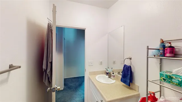 a room with furniture and a wooden floor