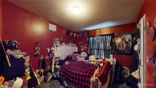 a childrens park with swings and slides