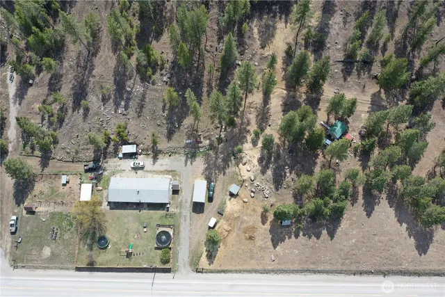 an aerial view of residential house with outdoor space