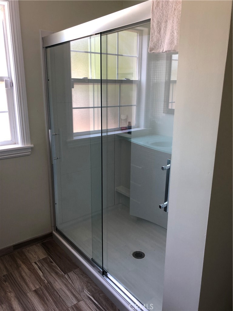 10404 Foothill Boulevard Sylmar, CA 91342 - Photo 11 of 29 a bathroom with a shower