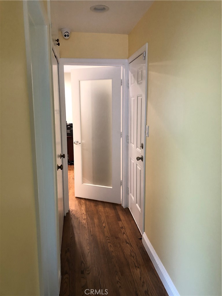 10404 Foothill Boulevard Sylmar, CA 91342 - Photo 12 of 29 a view of wooden door