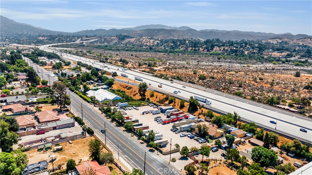10404 Foothill Boulevard Sylmar, CA 91342 - Photo 29 of 29 an aerial view of house with yard and mountain view in back