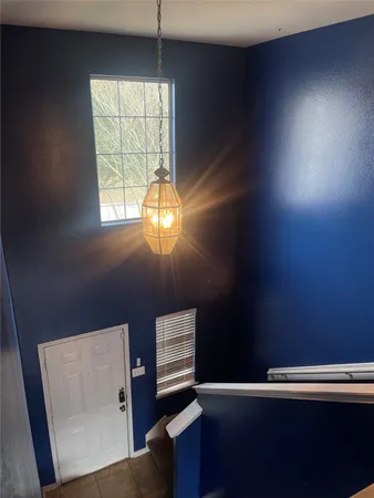 a view of a room with a window