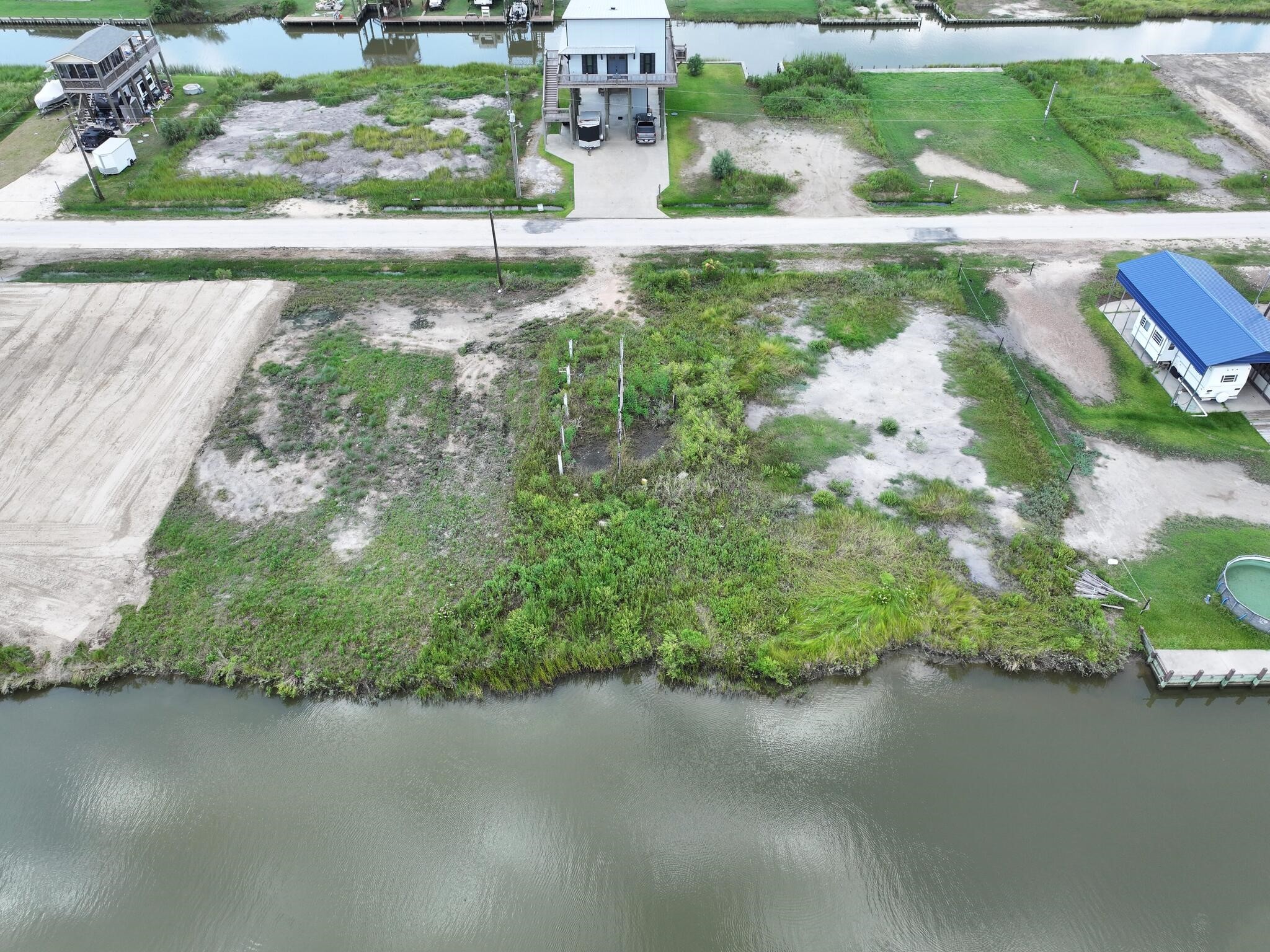 1392 Mabry Port Bolivar, TX 77650 - Photo 12 of 25 a view of a garden with a lake view