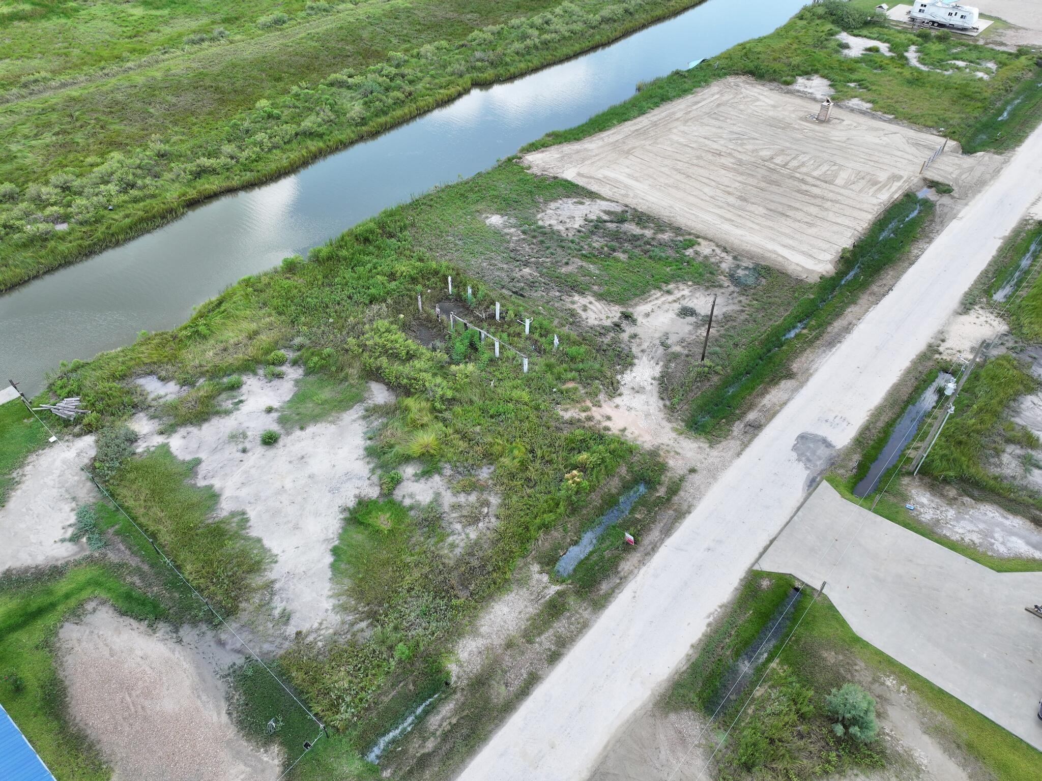 1392 Mabry Port Bolivar, TX 77650 - Photo 15 of 25 a view of a yard with potted plants