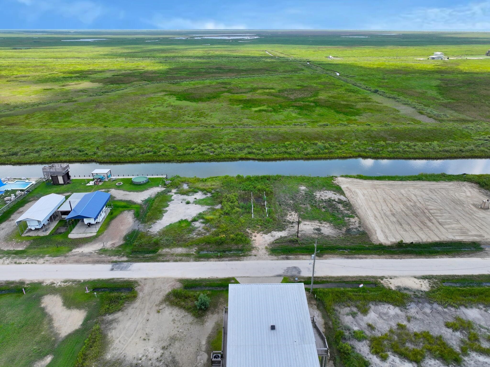 1392 Mabry Port Bolivar, TX 77650 - Photo 17 of 25 a view of an outdoor space and a lake view