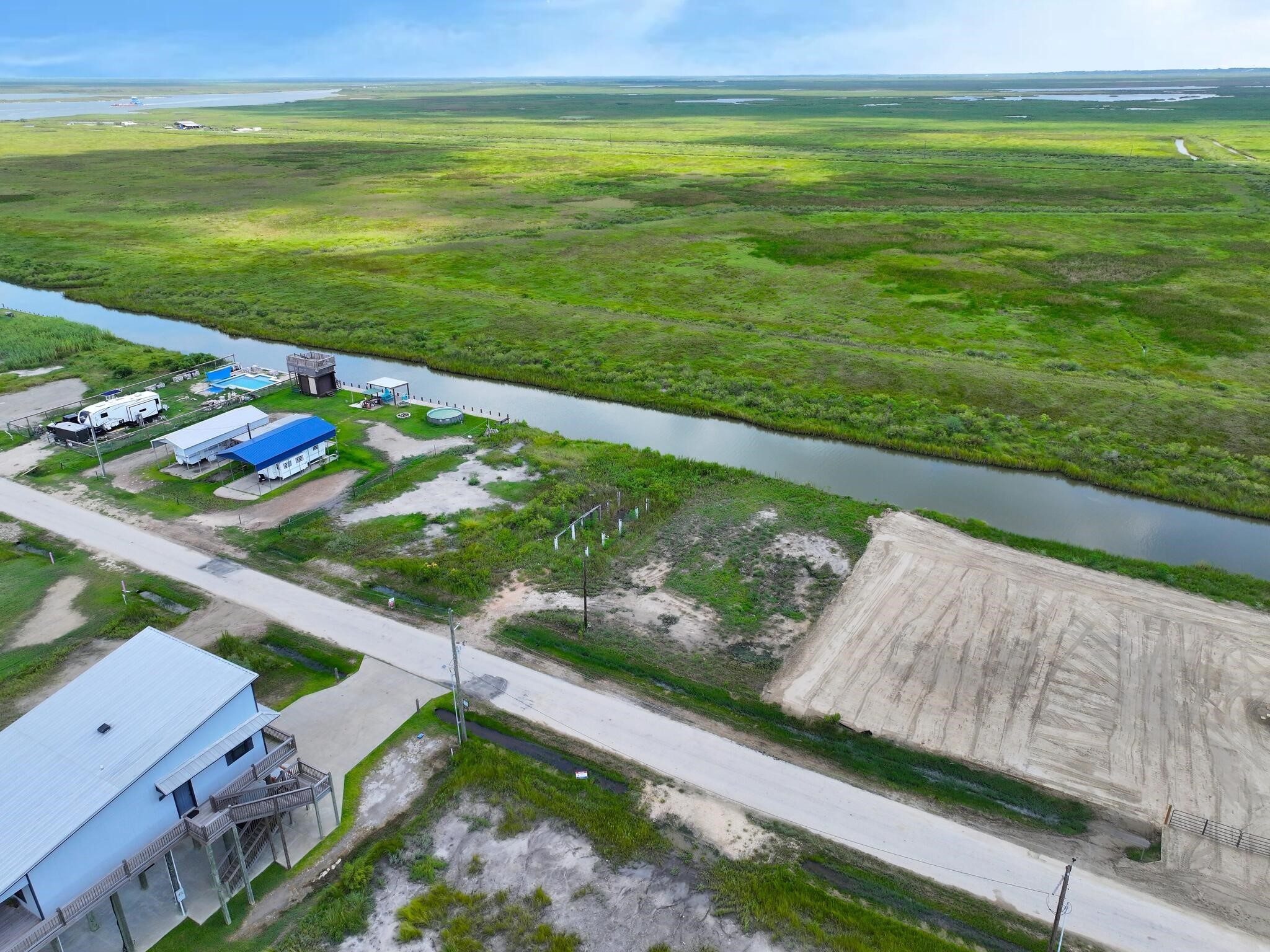 1392 Mabry Port Bolivar, TX 77650 - Photo 20 of 25 a view of an ocean from a balcony