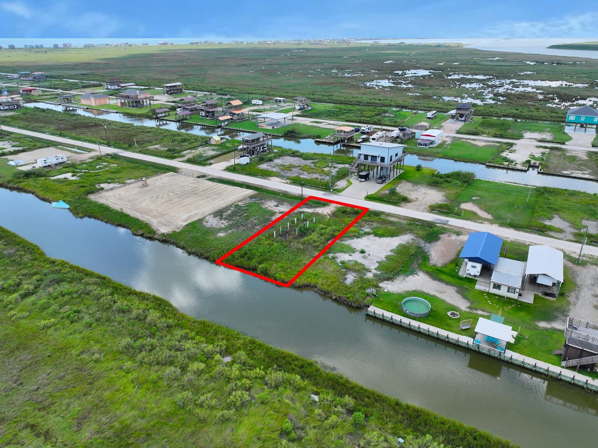 1392 Mabry Port Bolivar, TX 77650 - Photo 3 of 25 an aerial view of a city