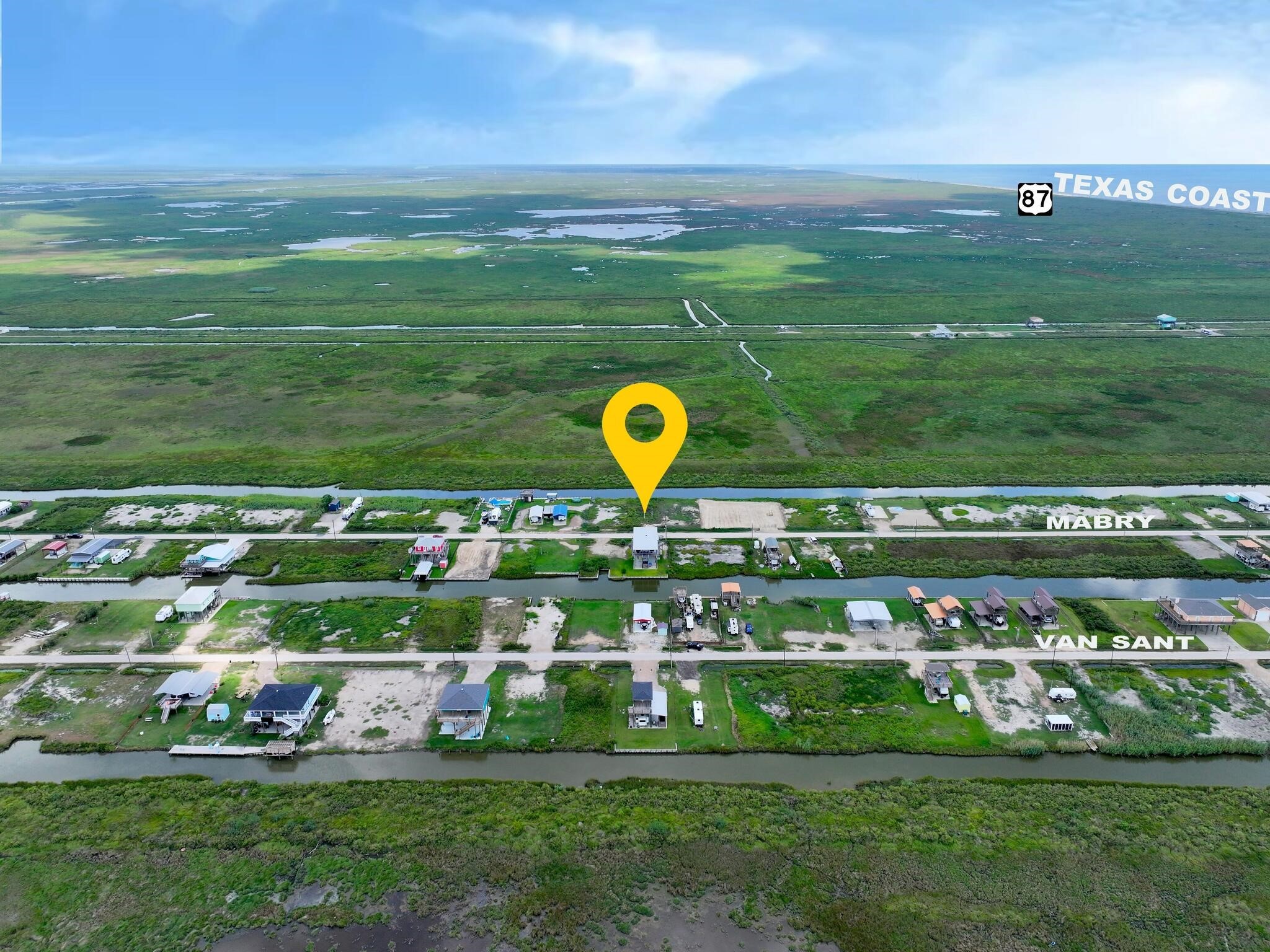 1392 Mabry Port Bolivar, TX 77650 - Photo 5 of 25 a view of a park with large trees