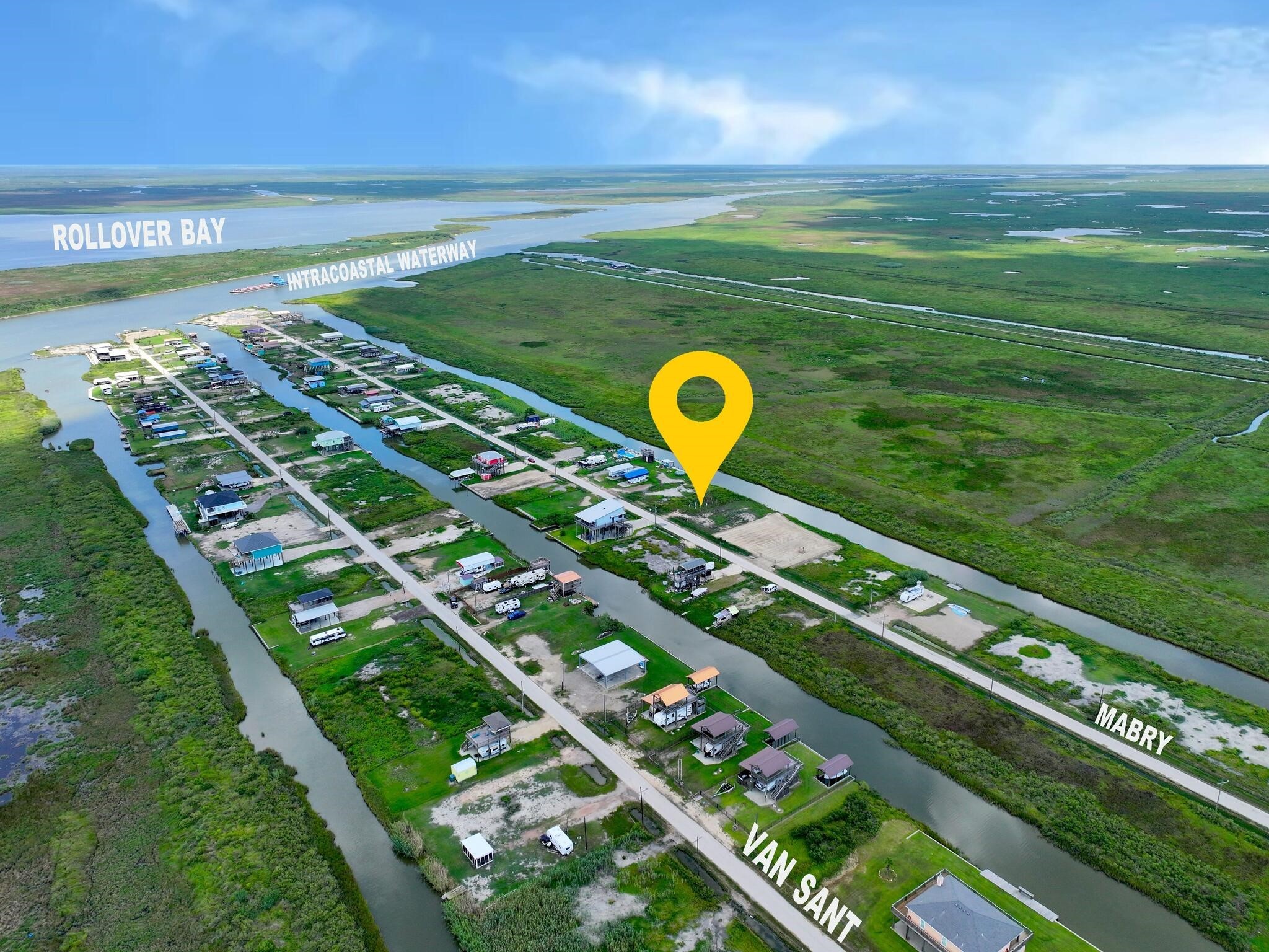 1392 Mabry Port Bolivar, TX 77650 - Photo 6 of 25 a view of a back yard of a house