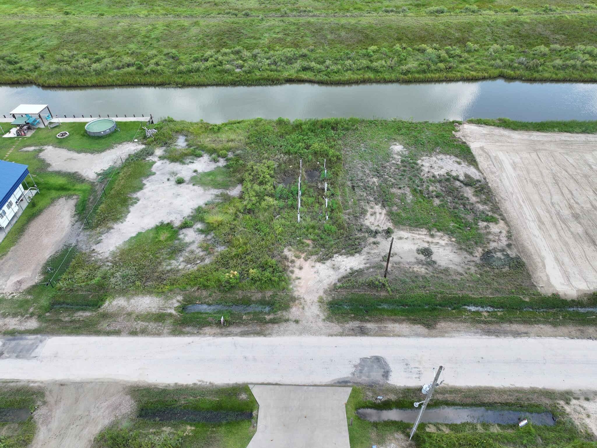 1392 Mabry Port Bolivar, TX 77650 - Photo 8 of 25 a view of a lake with a park