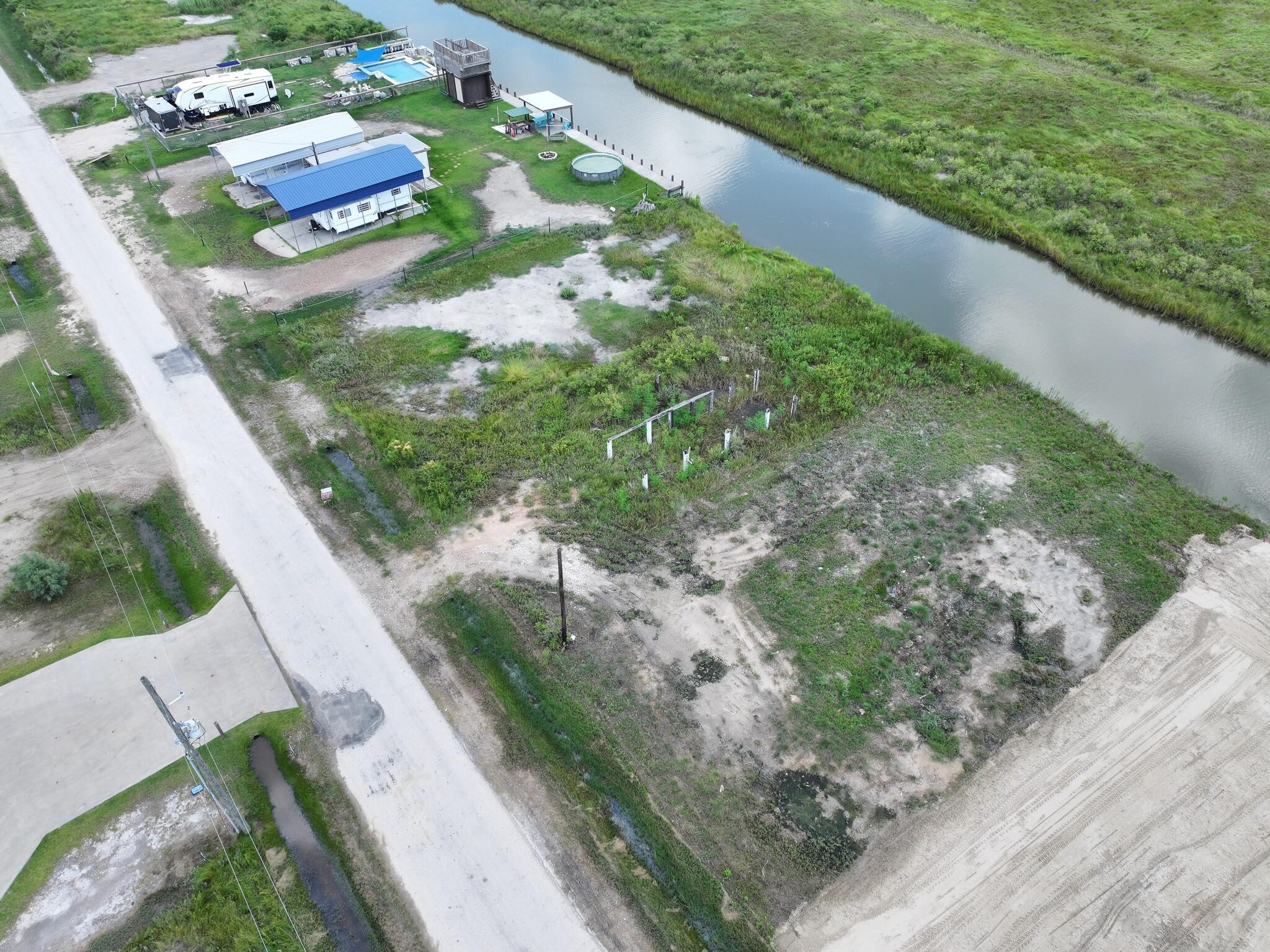 1392 Mabry Port Bolivar, TX 77650 - Photo 9 of 25 a view of a garden with an outdoor seating