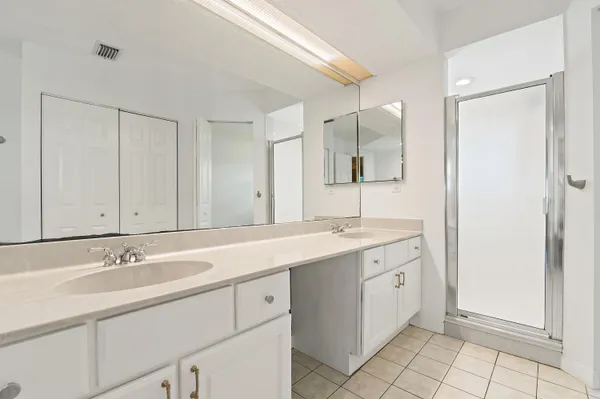 a view of a livingroom with furniture window and wooden floor