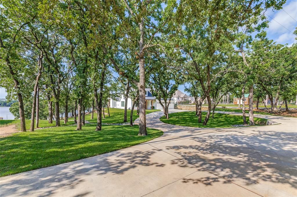 1757 Country Club Road Bowie, TX 76230 - Photo 38 of 40 a huge green field with lots of trees