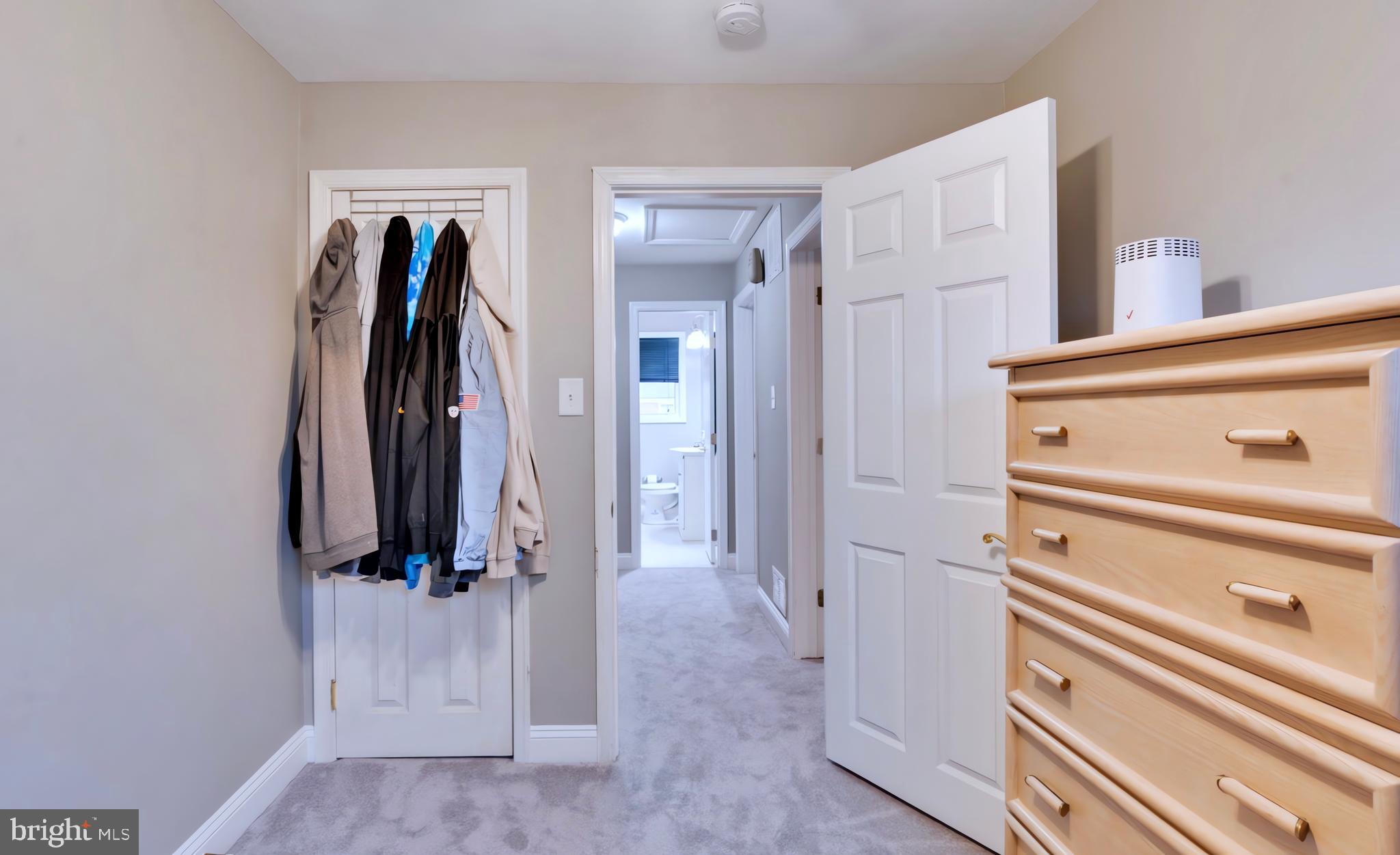 65 Garden Ridge Road Catonsville, MD 21228 - Photo 11 of 19 a view of walk in closet with clothes and shoes