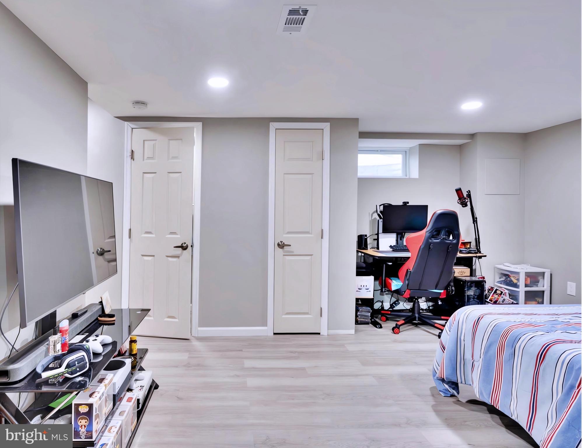 65 Garden Ridge Road Catonsville, MD 21228 - Photo 14 of 19 a bed room with a bed and a chair