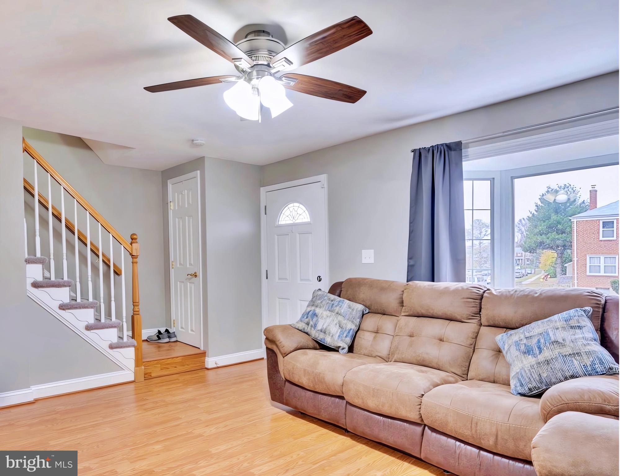 65 Garden Ridge Road Catonsville, MD 21228 - Photo 3 of 19 a living room with furniture and a large window