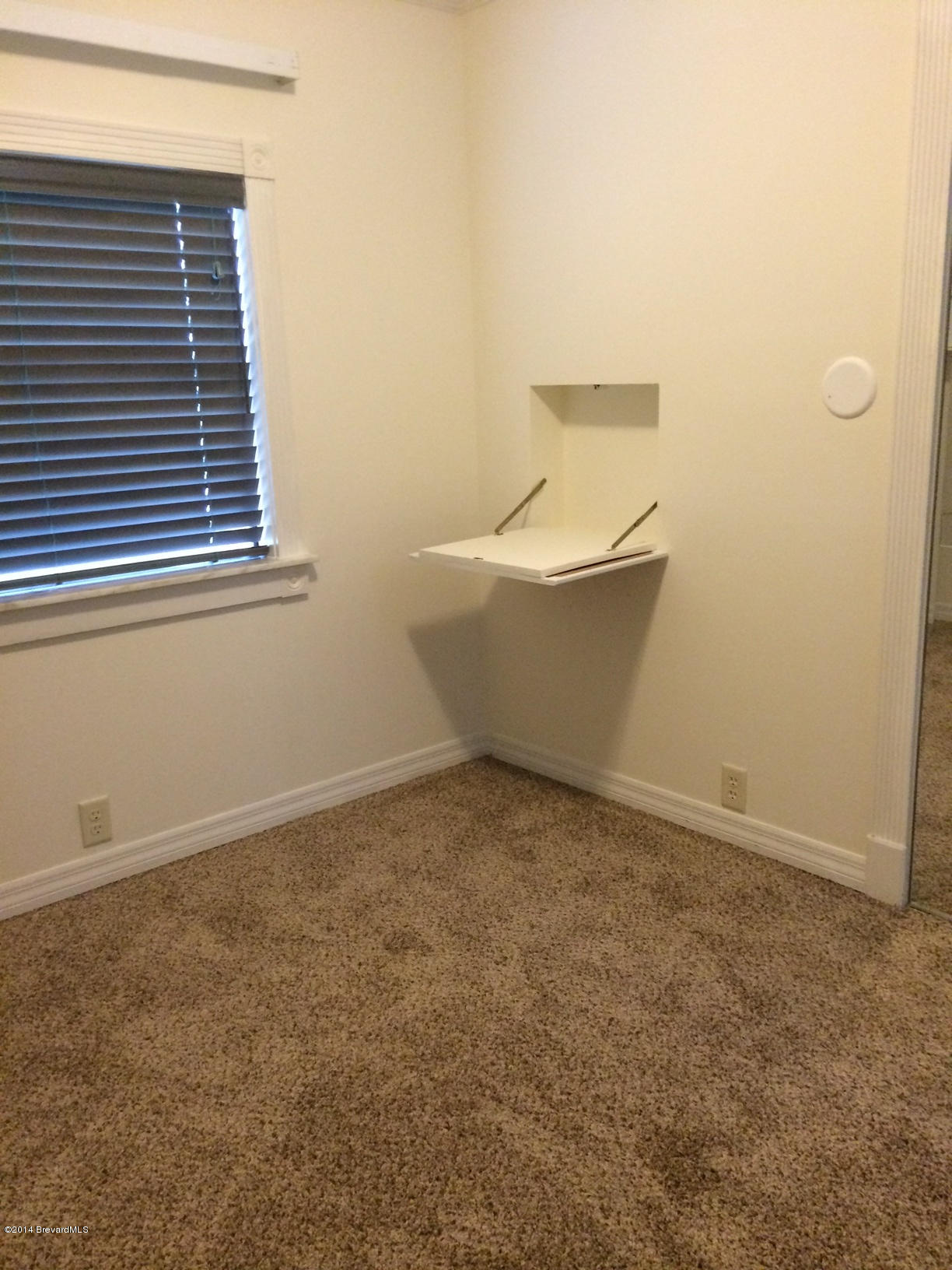 2529 Amberly Road Northeast Palm Bay, FL 32905 - Photo 13 of 21 Bedroom with desk