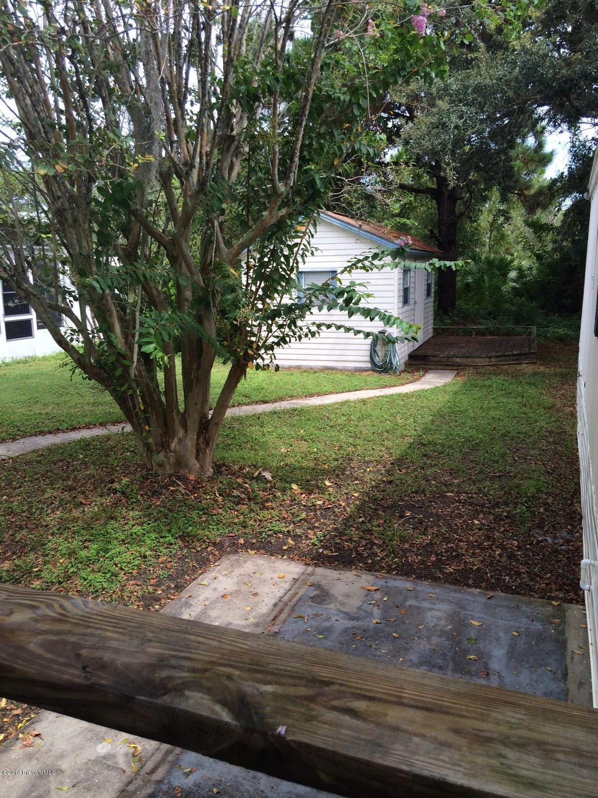 2529 Amberly Road Northeast Palm Bay, FL 32905 - Photo 17 of 21 Walkway to out building