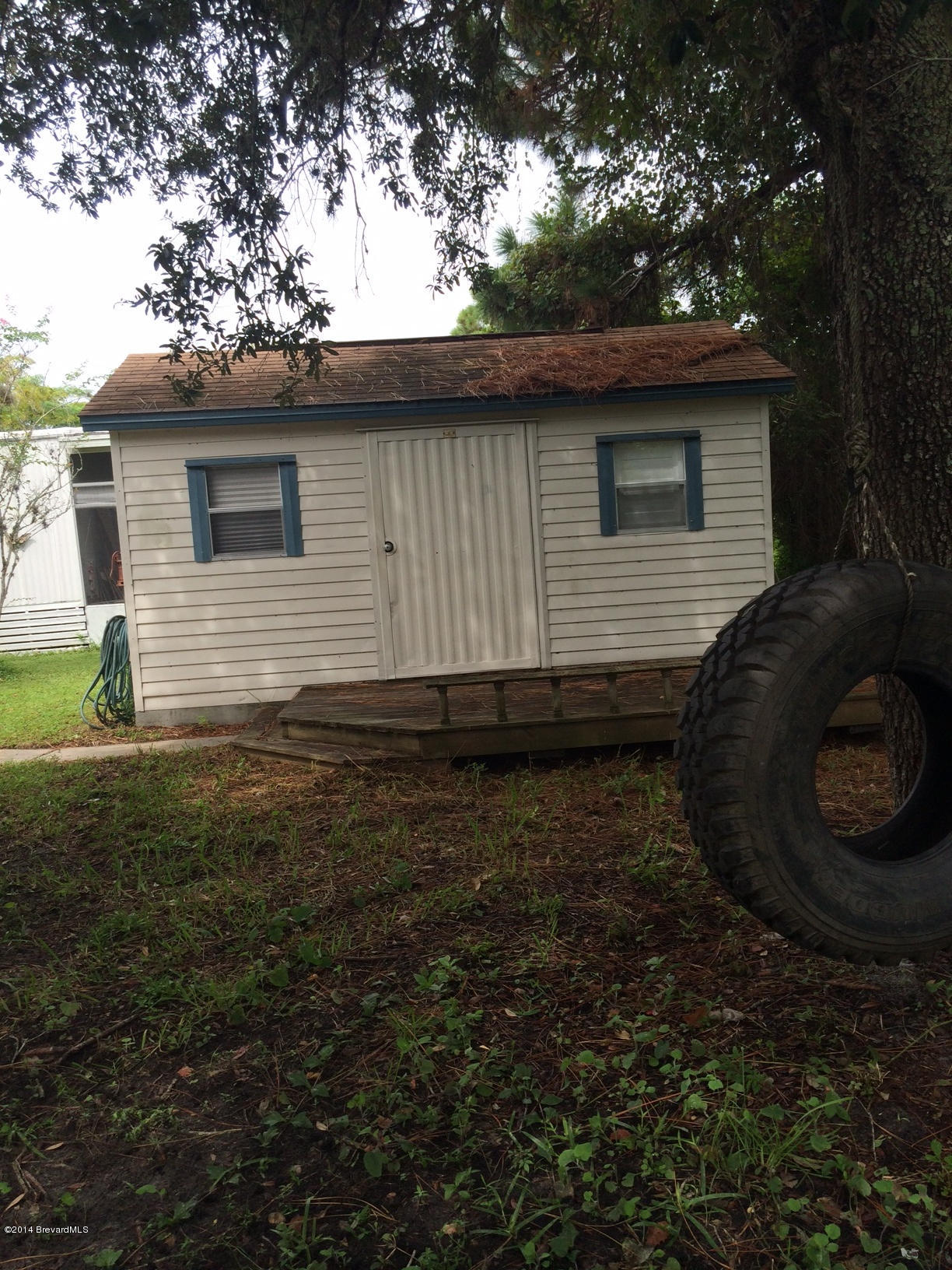2529 Amberly Road Northeast Palm Bay, FL 32905 - Photo 20 of 21 Out Building with Tire swing