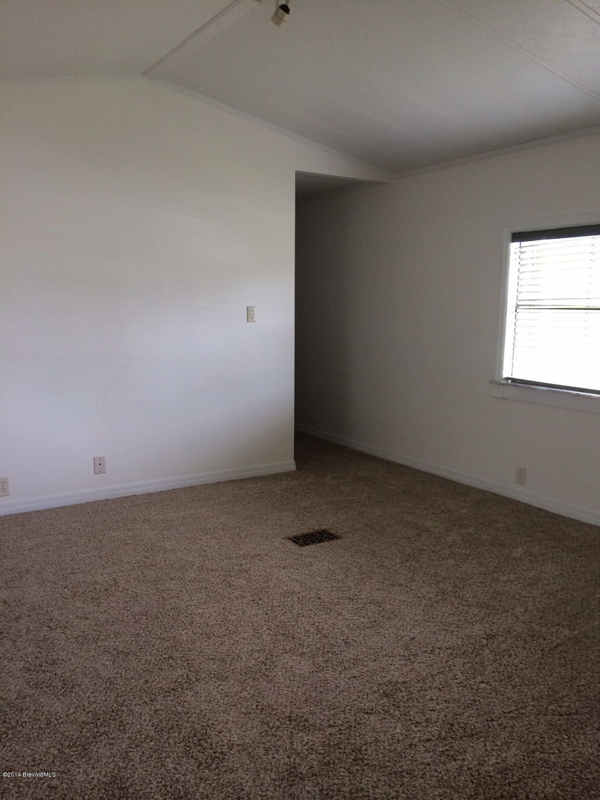 2529 Amberly Road Northeast Palm Bay, FL 32905 - Photo 4 of 21 Living Room1