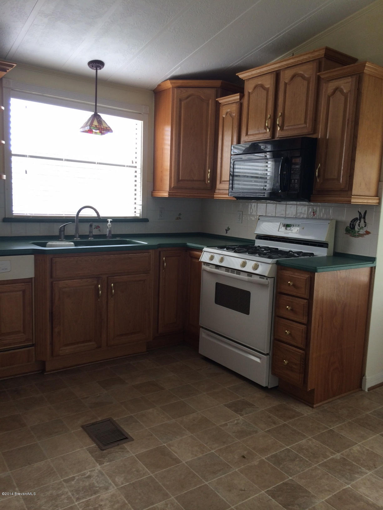 2529 Amberly Road Northeast Palm Bay, FL 32905 - Photo 7 of 21 Kitchen