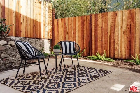 a view of outdoor space with chairs