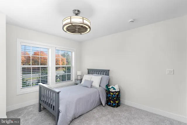 a view of balcony with wooden floor and fence