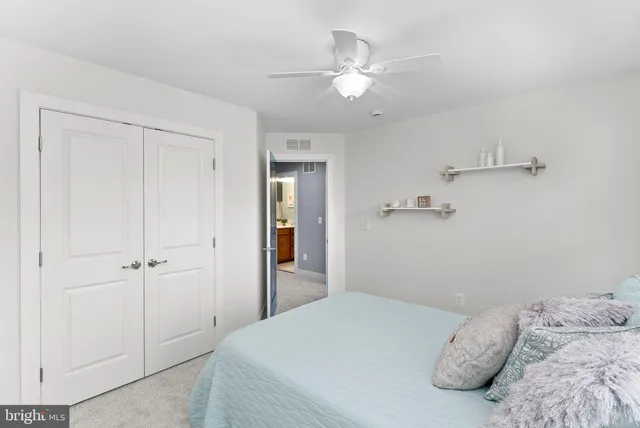 a view of a balcony with wooden floor
