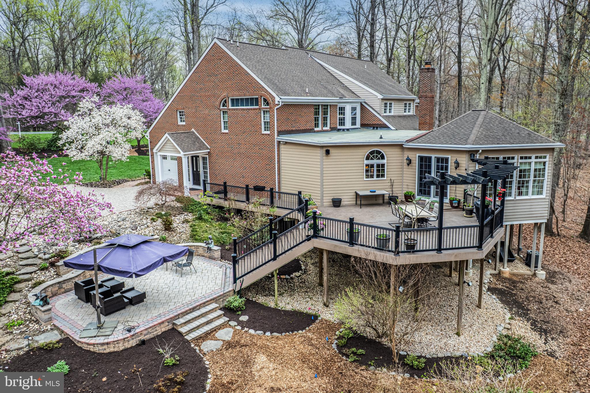 1206 Crystal Ridge Road Marriottsville, MD 21104 - Photo 11 of 72 a view of a house with backyard water fountain and sitting area