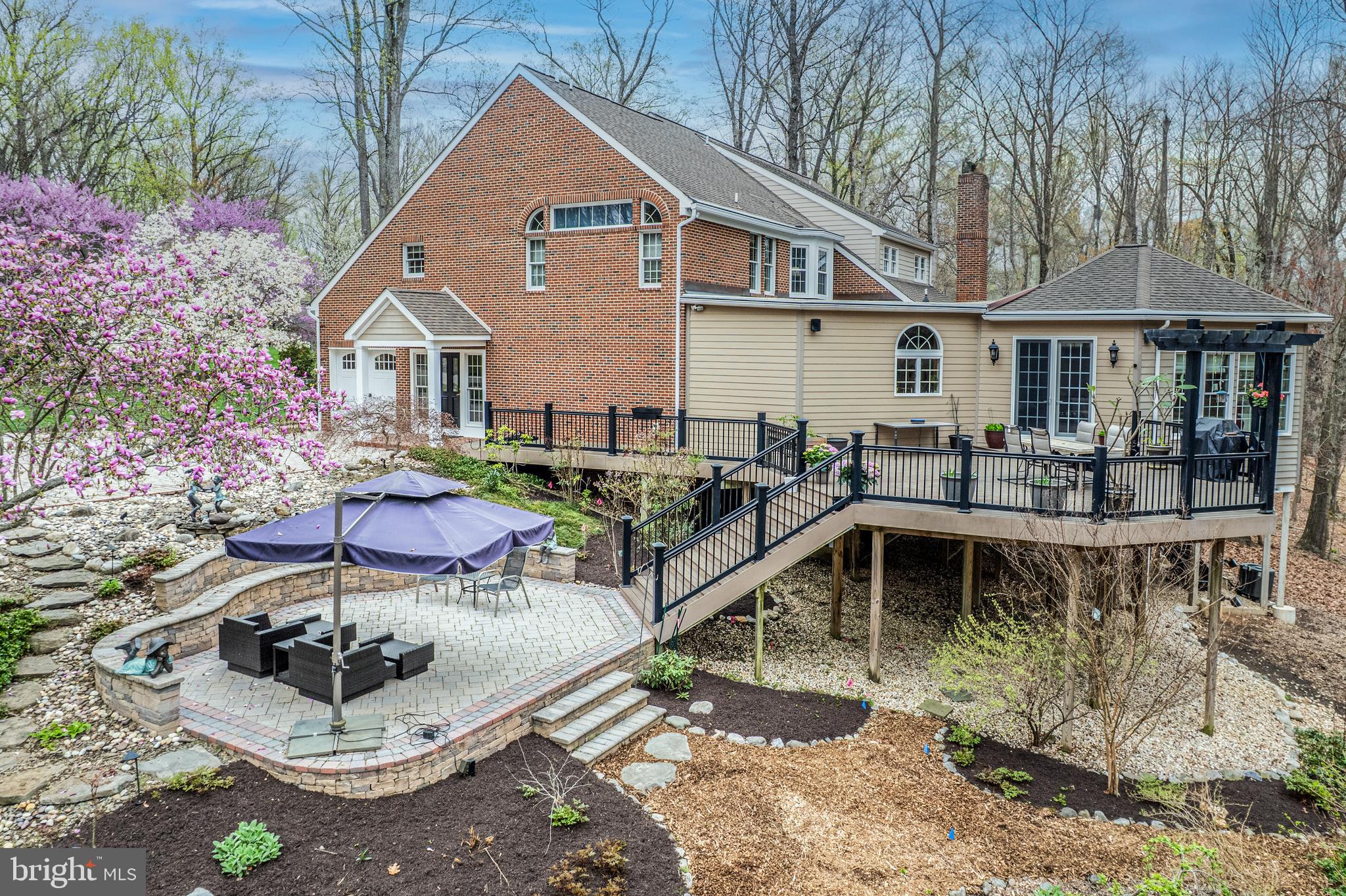1206 Crystal Ridge Road Marriottsville, MD 21104 - Photo 14 of 72 a front view of a house with garden