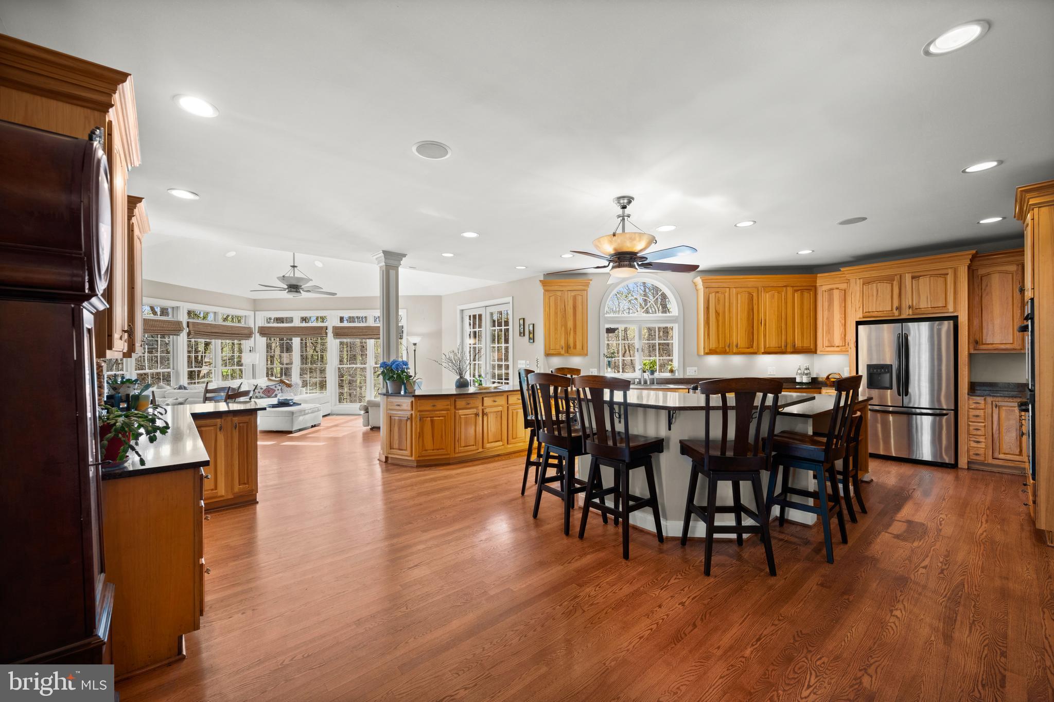 1206 Crystal Ridge Road Marriottsville, MD 21104 - Photo 26 of 72 a view of a dining room with furniture window and wooden floor
