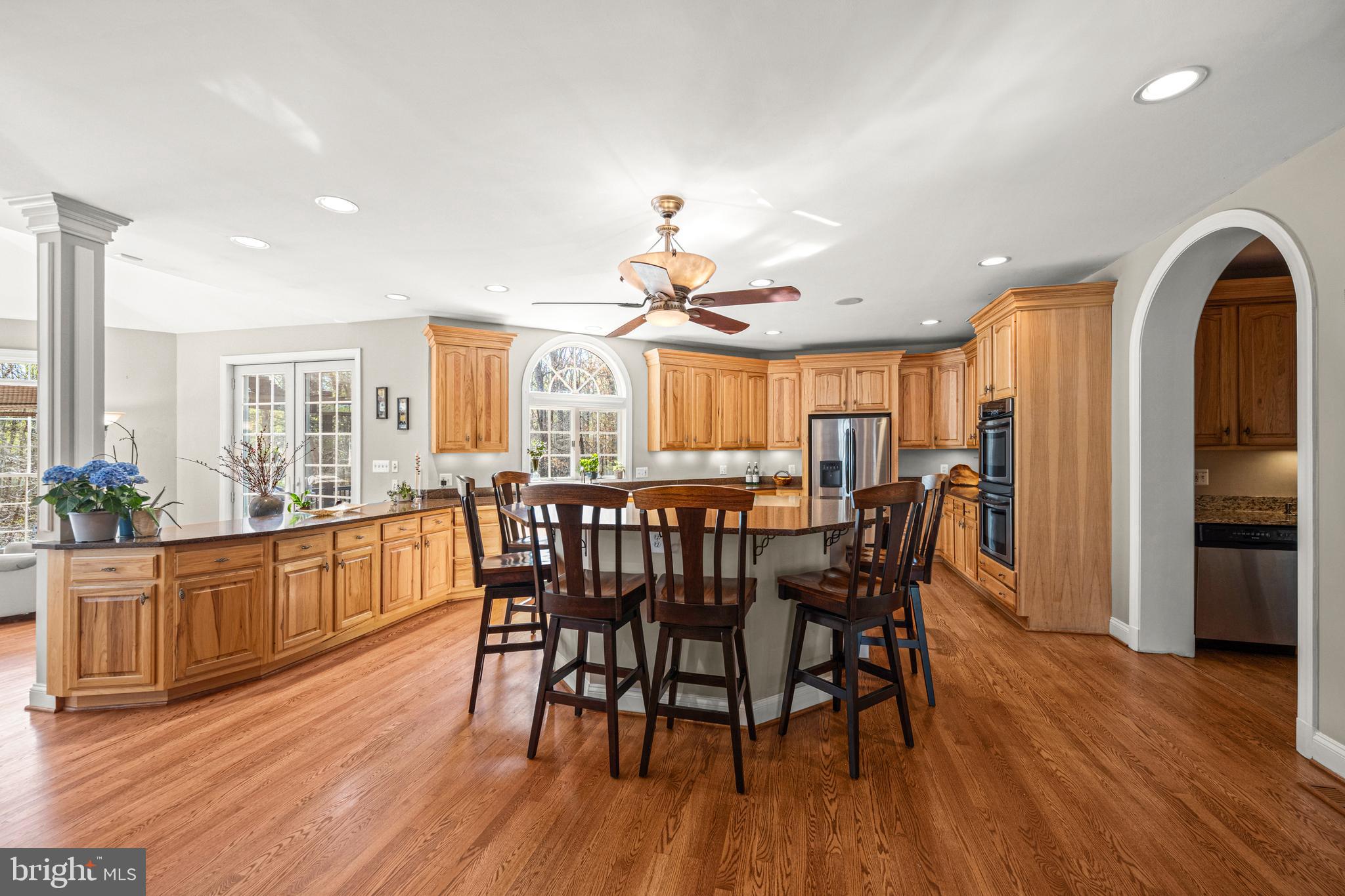 1206 Crystal Ridge Road Marriottsville, MD 21104 - Photo 28 of 72 a view of a dining room with furniture window and wooden floor