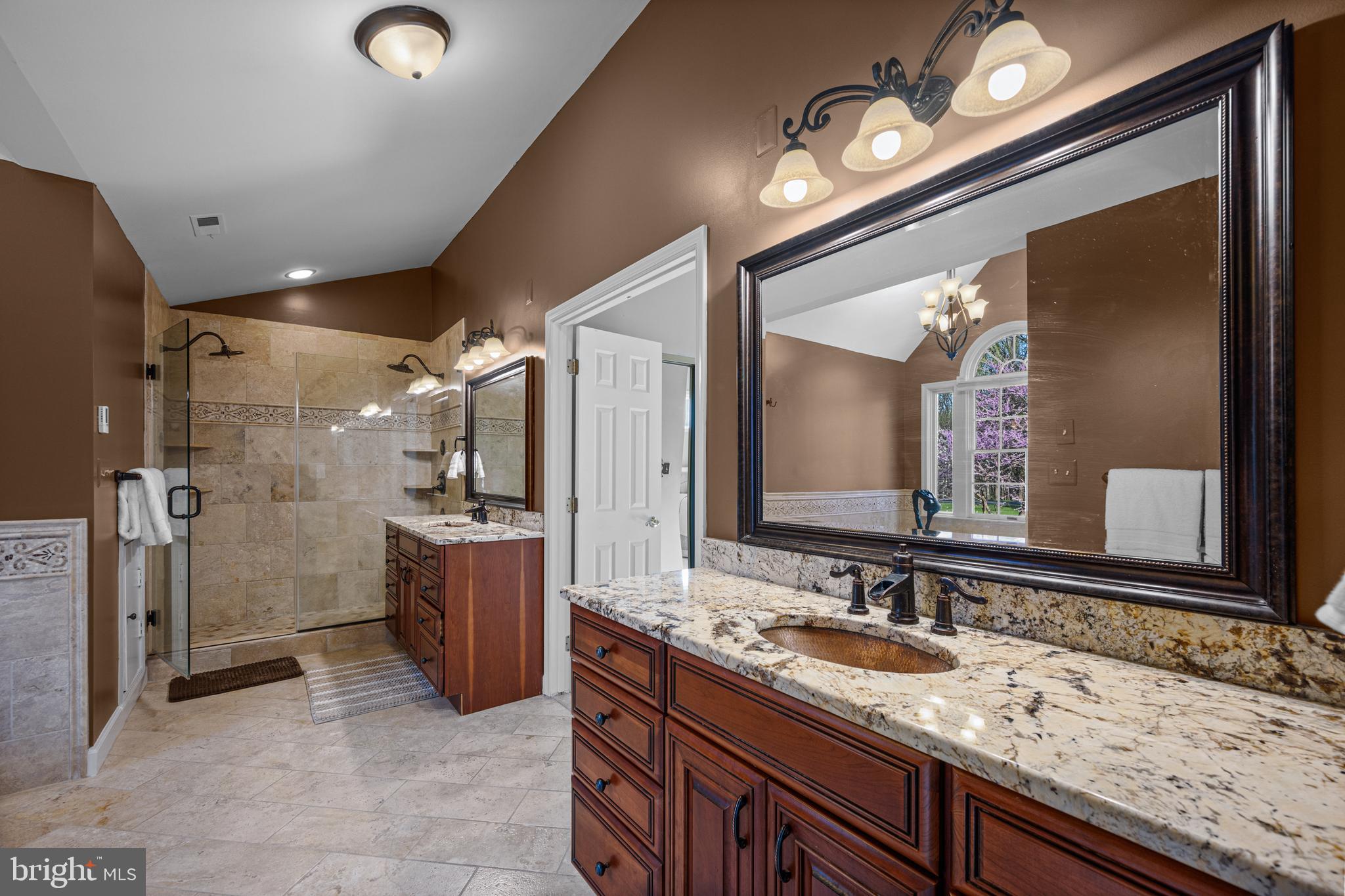 1206 Crystal Ridge Road Marriottsville, MD 21104 - Photo 38 of 72 a bathroom with a granite countertop sink mirror and shower