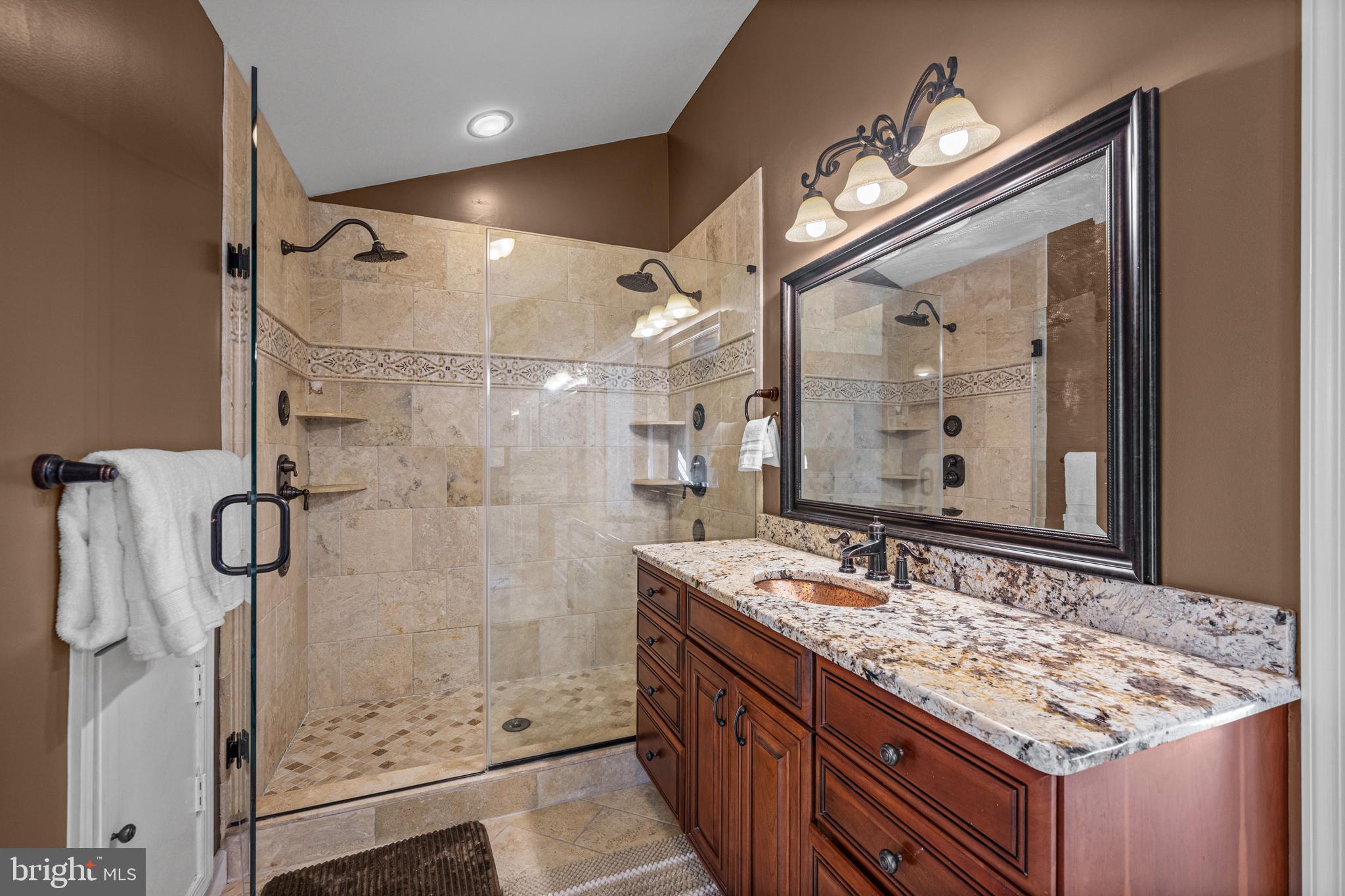 1206 Crystal Ridge Road Marriottsville, MD 21104 - Photo 39 of 72 a bathroom with a sink and a mirror