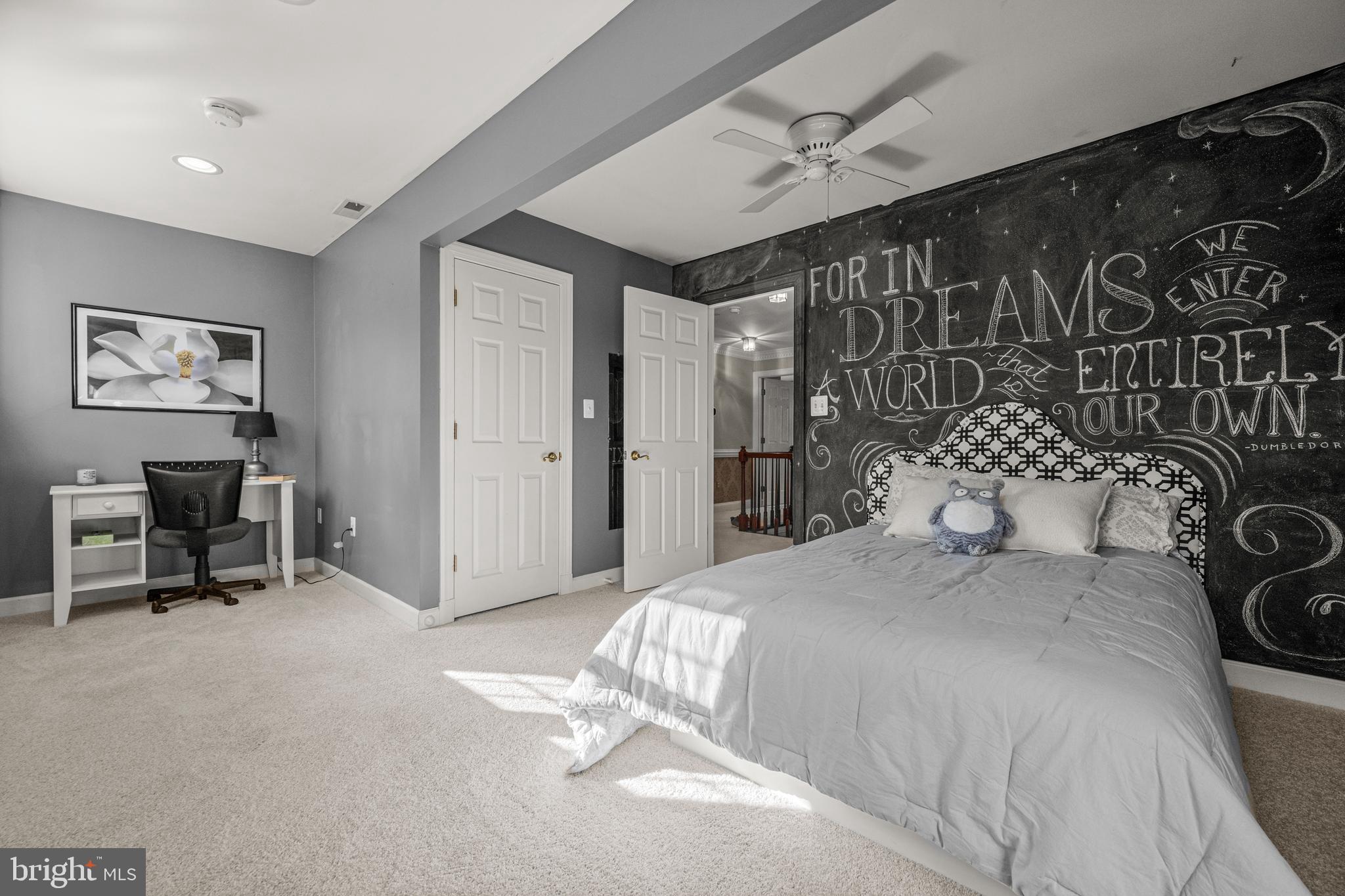 1206 Crystal Ridge Road Marriottsville, MD 21104 - Photo 45 of 72 a bedroom with a large bed and a chair