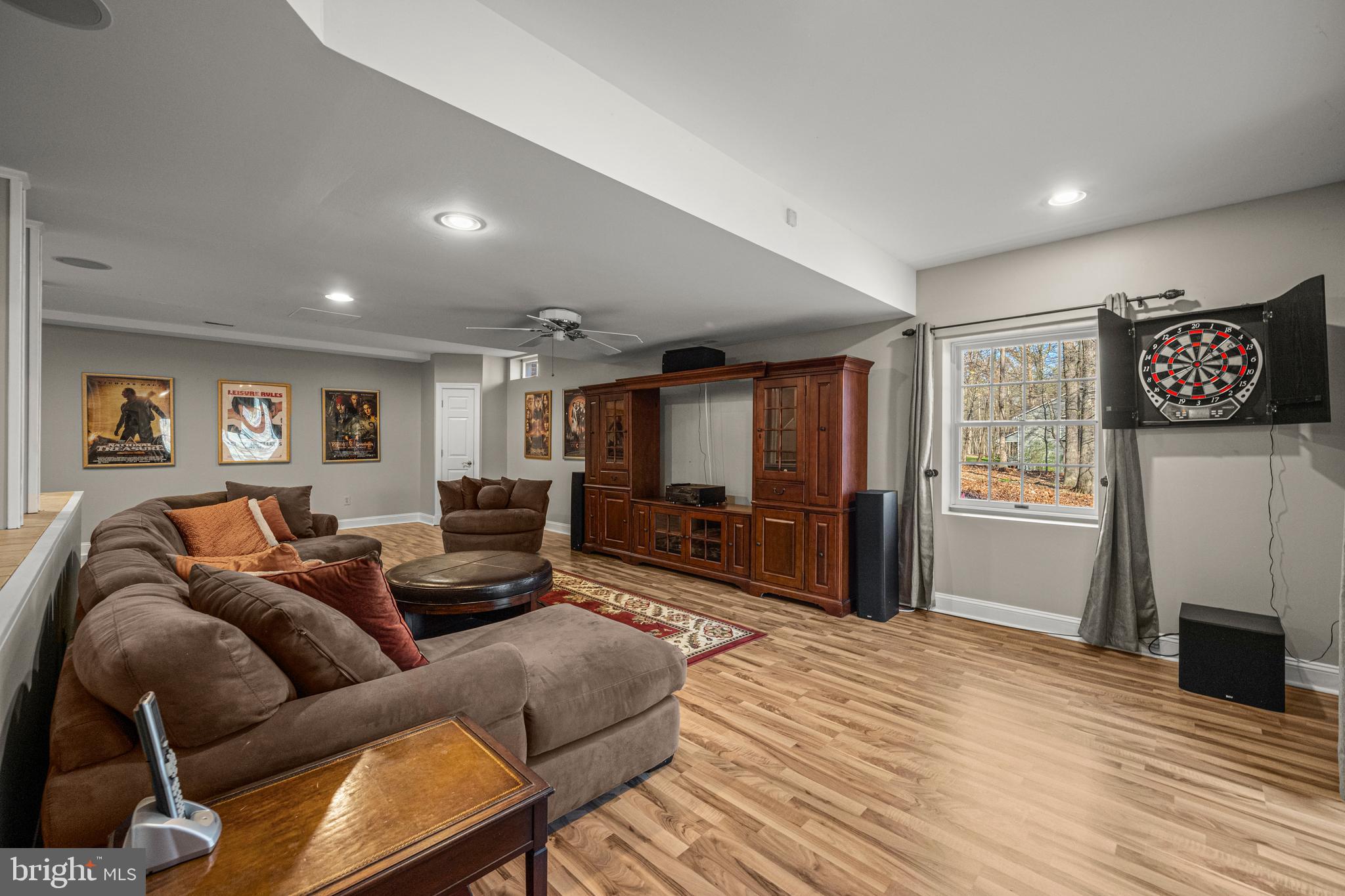 1206 Crystal Ridge Road Marriottsville, MD 21104 - Photo 52 of 72 a living room with furniture and a flat screen tv