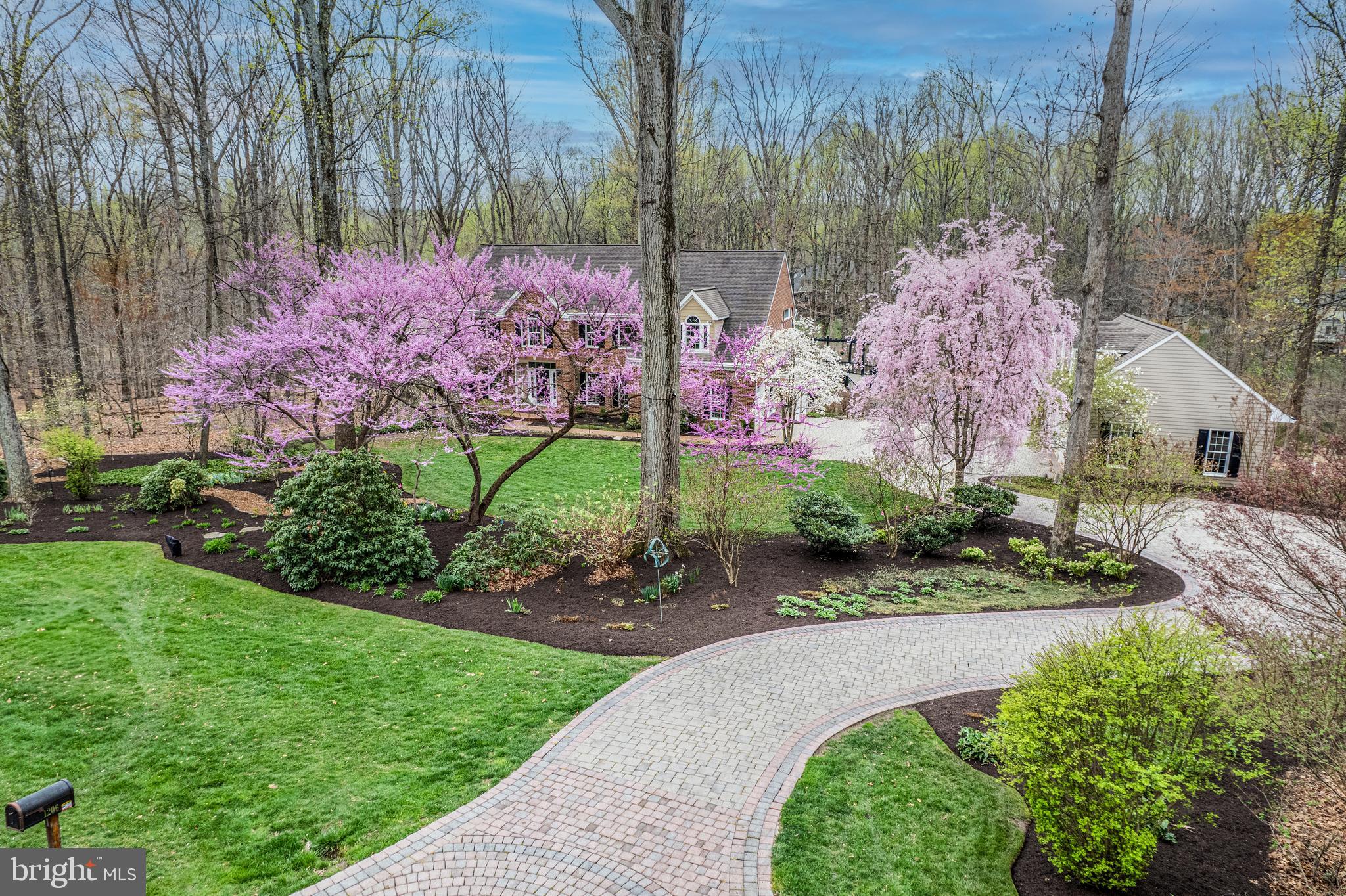 1206 Crystal Ridge Road Marriottsville, MD 21104 - Photo 6 of 72 a front view of a house with a yard and a large tree