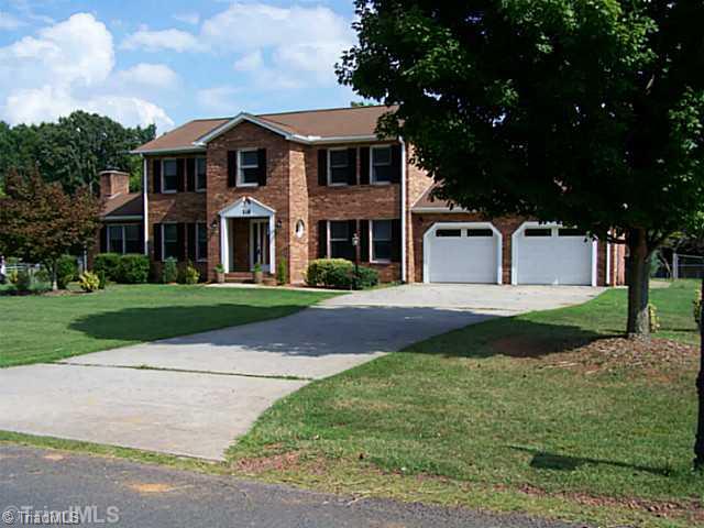 118 Raintree Road Advance, NC 27006 - Photo 1 of 16 Exterior Front. Concrete drive and 2 car garage.