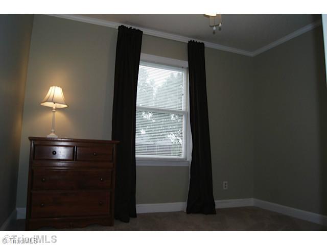 118 Raintree Road Advance, NC 27006 - Photo 11 of 16 1st Bedroom. Lots of light ,new paint and carpet.