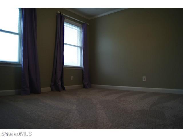 118 Raintree Road Advance, NC 27006 - Photo 13 of 16 3rd Bedroom. Lots of light, new paint and carpet.
